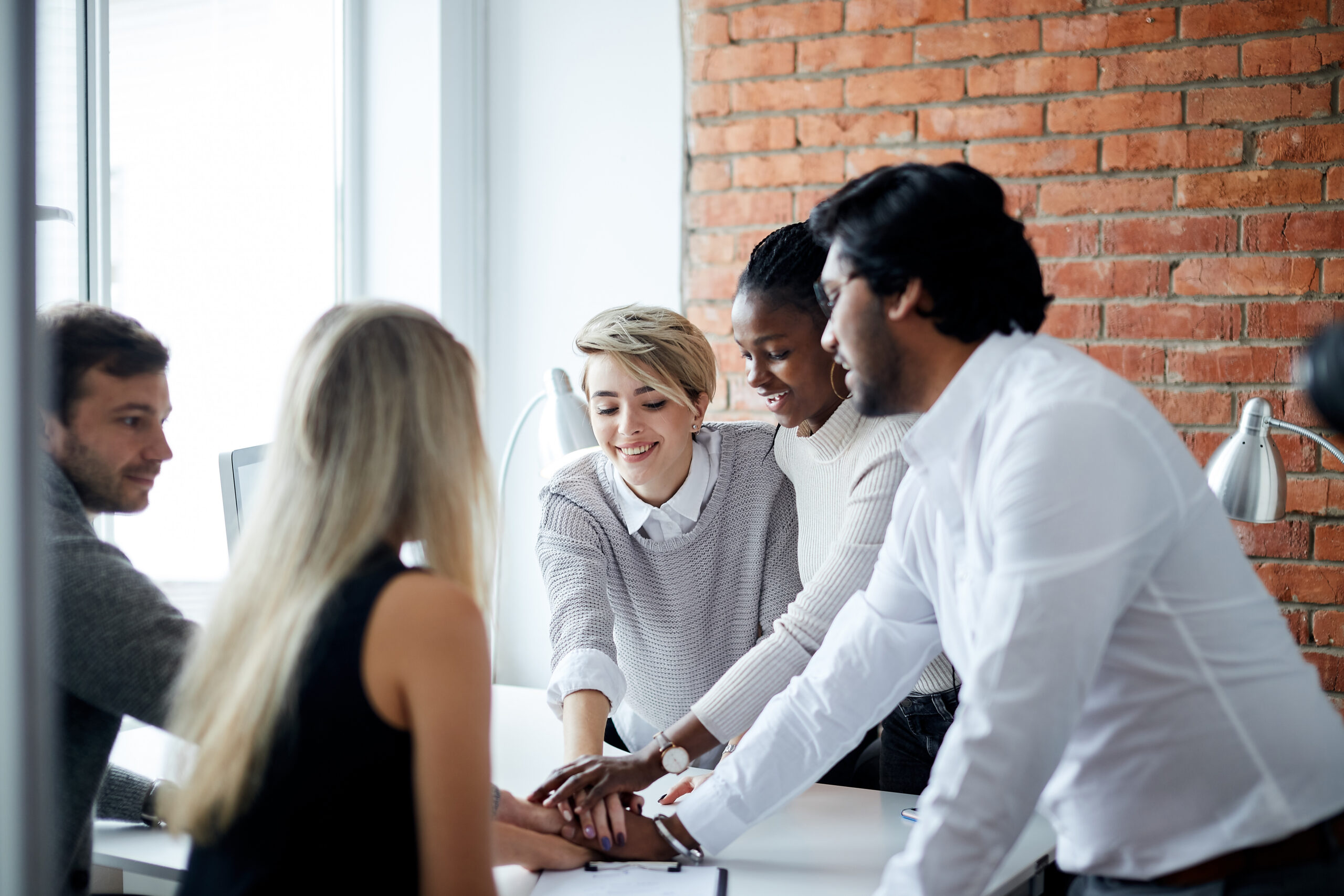 A group of people recognizing the importance of collaboration